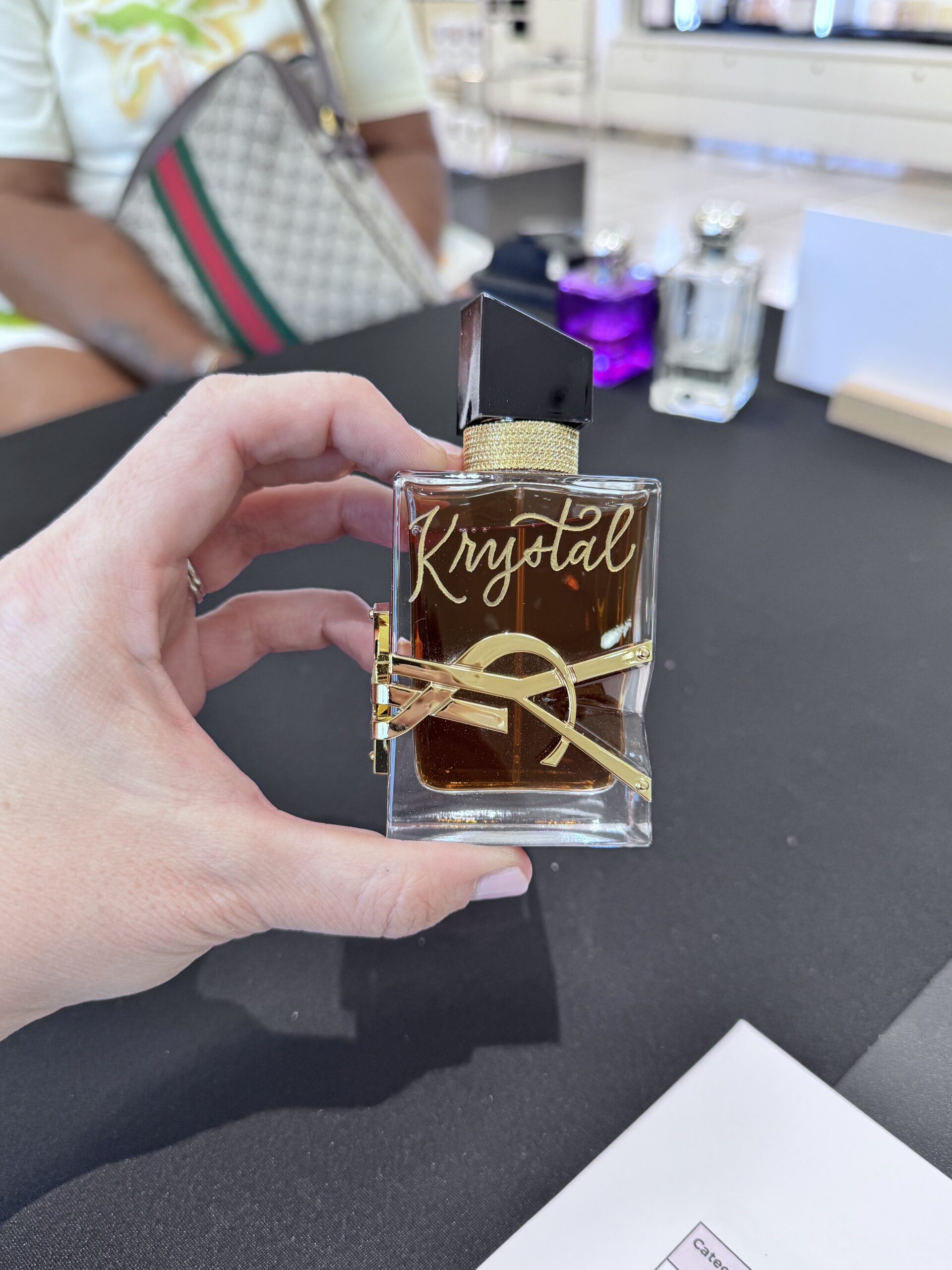 Gold-Black-Glass-Spray-Bottle-YSL-Yves-Saint-Laurent-Libre-Intense-Eau-de-Parfum-Calligraphy-Engraved-Krystal-Live-Event-Artist-KPCalligraphy-Nordstrom-Atlanta-Georgia-Mothers-Day-2025-scaled.jpg